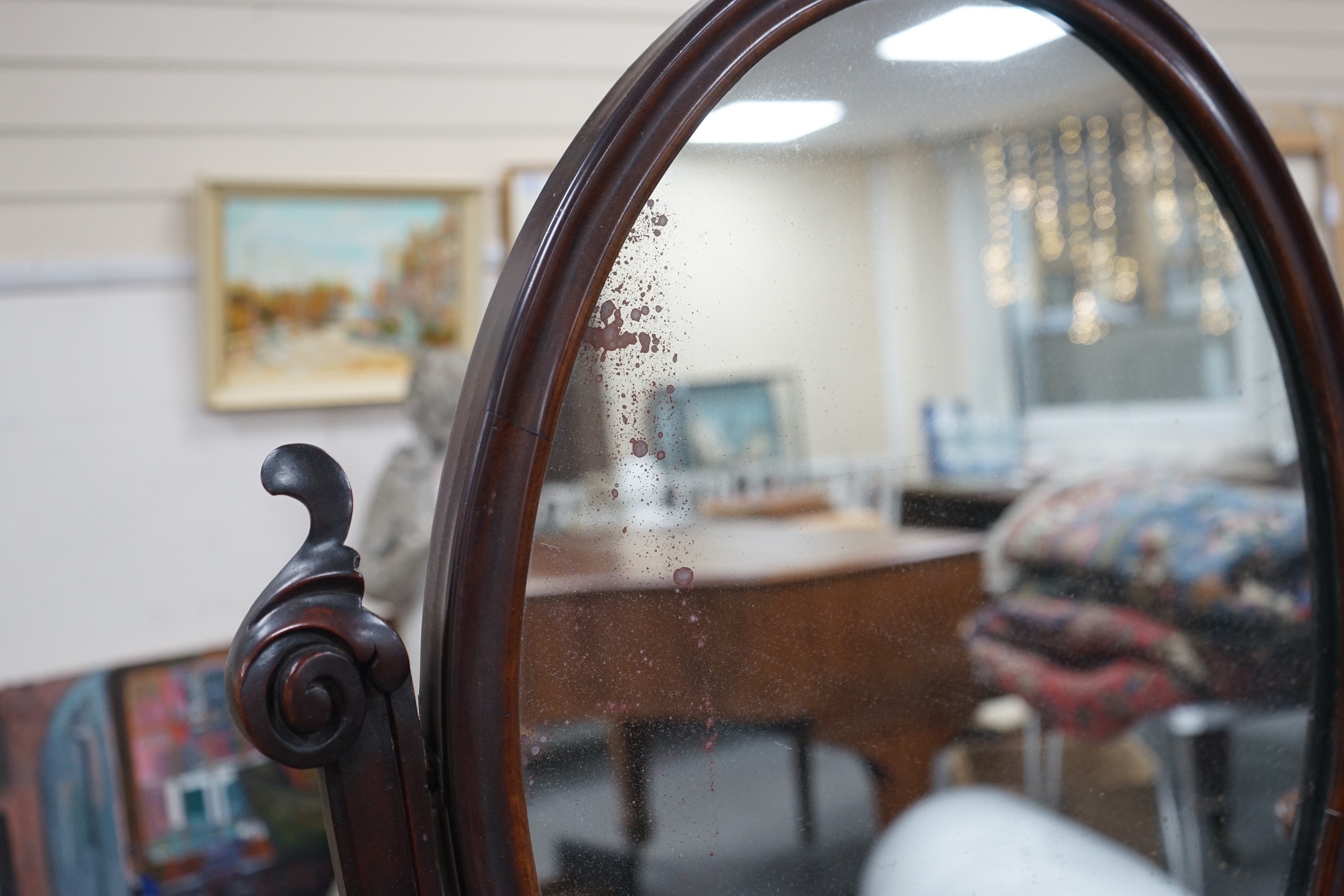 A Victorian mahogany toilet mirror with compartment base, width 66cm, height 82cm